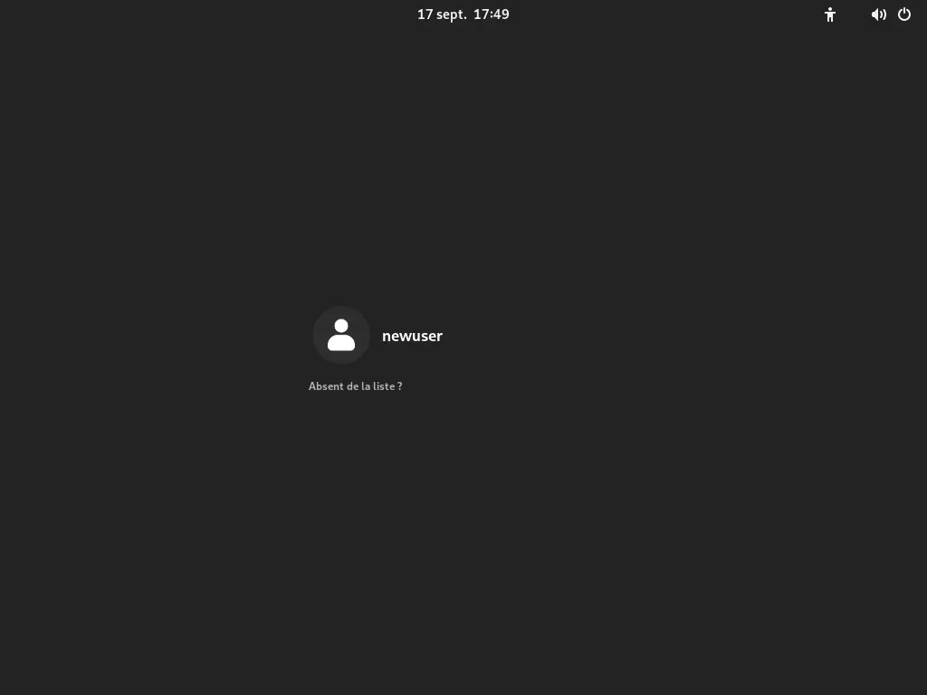 Écran de connexion du gestionnaire d'affichage GNOME (GDM) sur ArchLinux, montrant un utilisateur nommé 'newuser' avec un thème sombre.