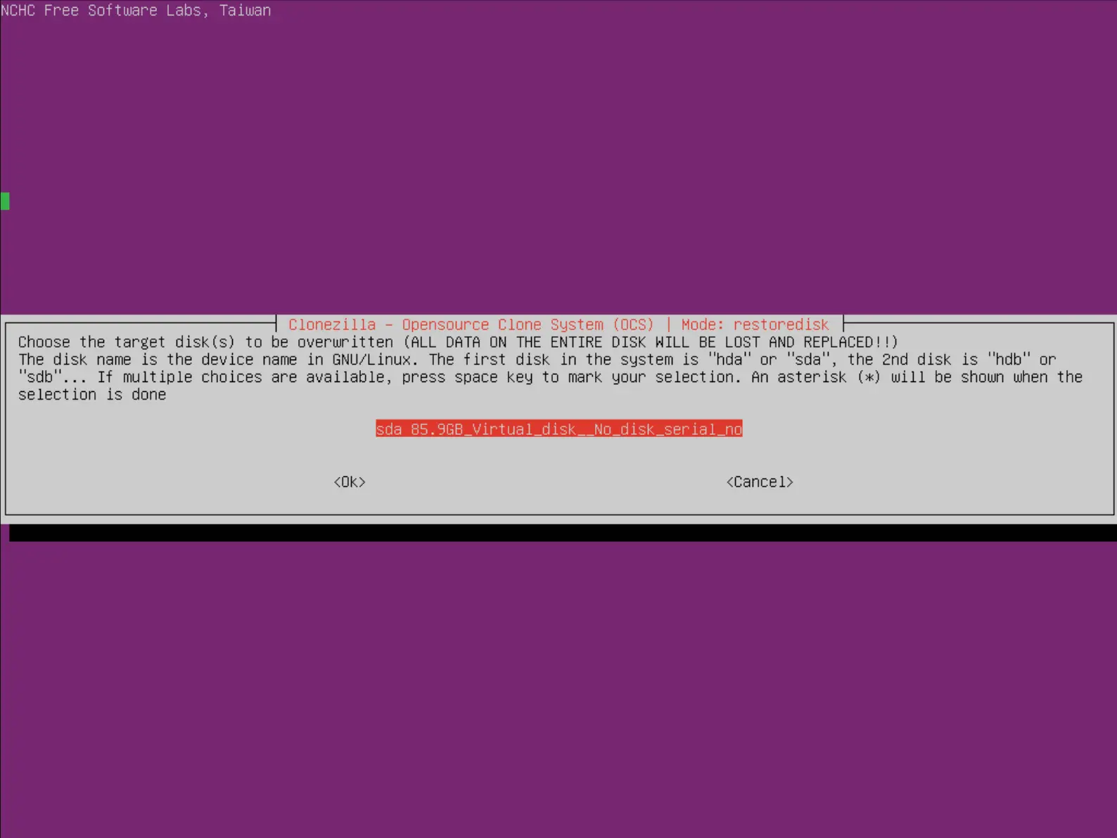 Capture d'écran de l'interface de Clonezilla invitant l'utilisateur à sélectionner le disque cible pour la restauration, avec un avertissement concernant l'écrasement de toutes les données et le disque sda 85.9GB Virtual_disk_No_disk_serial_no mis en évidence.