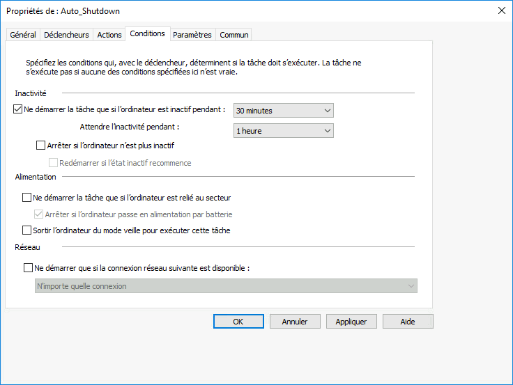 Capture d'écran de l'onglet Conditions des propriétés de la tâche Auto_Shutdown, avec des options permettant de lancer la tâche si l'ordinateur est inactif pendant 30 minutes.