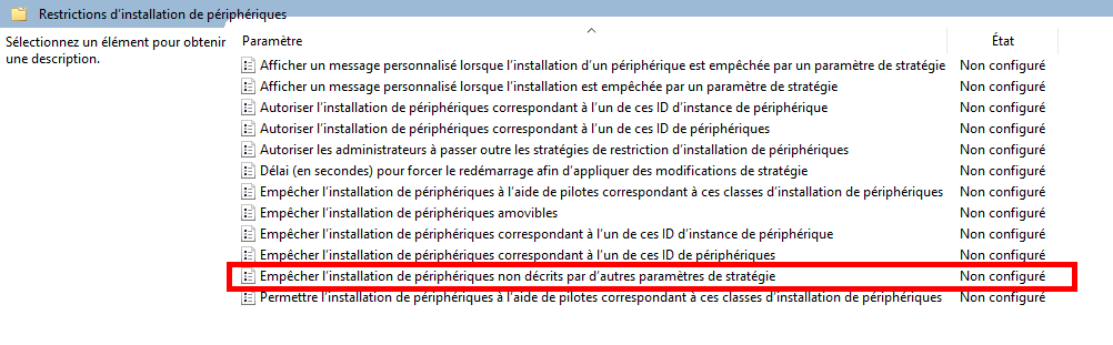 Capture d'écran de l'éditeur de stratégie de groupe montrant le paramètre 'Empêcher l'installation de périphériques non décrits par d'autres paramètres de stratégie' dans la section des restrictions d'installation de périphériques, avec l'état défini sur 'Non configuré' et une mise en évidence rouge.