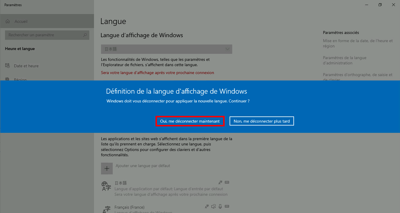 Invitation de Windows à confirmer la déconnexion pour appliquer le changement de langue d'affichage, avec le bouton « Oui, déconnexion maintenant » en surbrillance.