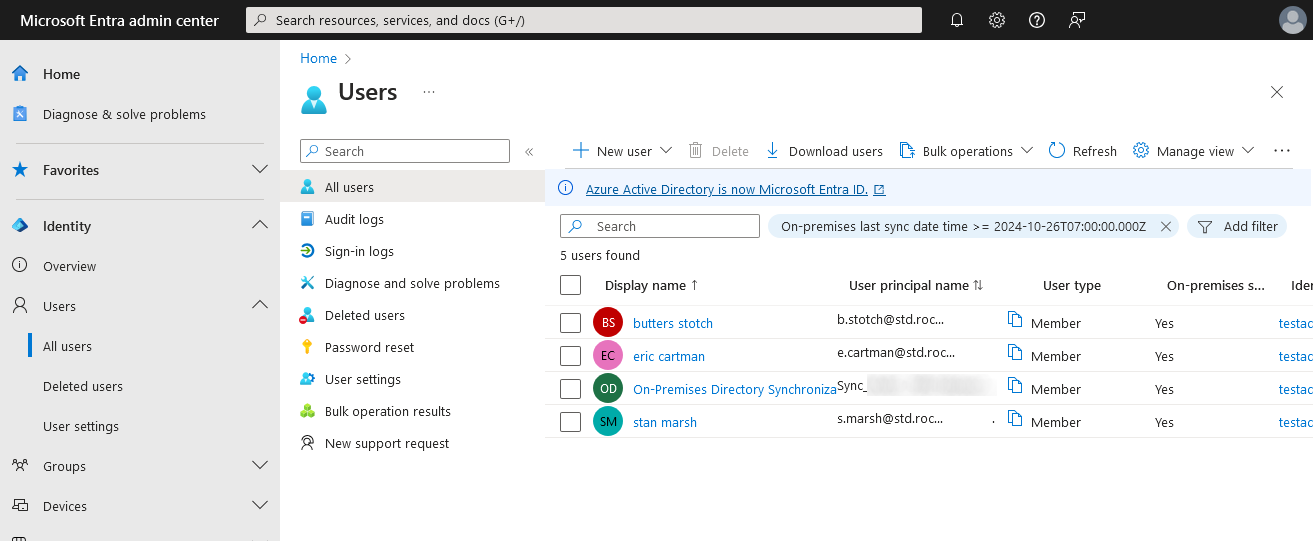 Microsoft Entra admin center showing the 'Users' page. The list displays user accounts, including 'butters stotch,' 'eric cartman,' and 'stan marsh,' with details such as user principal names and synchronization status. The interface indicates that Azure Active Directory is now Microsoft Entra ID.