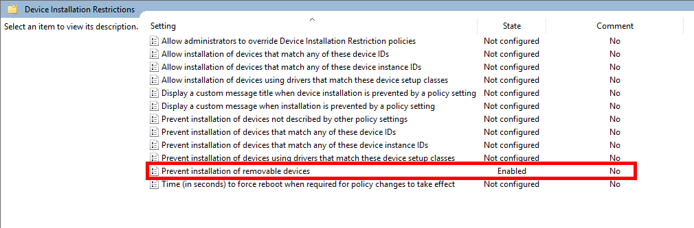 Screenshot of Group Policy editor with 'Prevent installation of removable devices' setting enabled under Device Installation Restrictions.