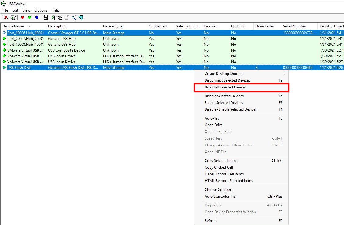 Screenshot of USBDeview tool showing a list of USB devices with the context menu open and the 'Uninstall Selected Devices' option highlighted.