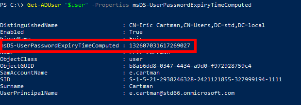 Screenshot of a PowerShell command output showing detailed Active Directory properties for a user, including the msDS-UserPasswordExpiryTimeComputed attribute.