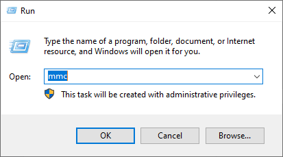Windows Run window with 'mmc' in the Open field
